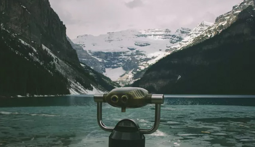 Tower viewer overlooks icy waters and snowcapped mountains